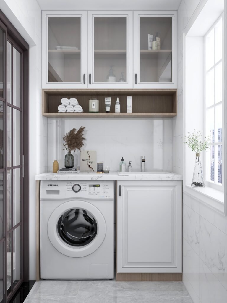 Modern laundry room with a washing machine, sink, and shelves for storage in Naples.
